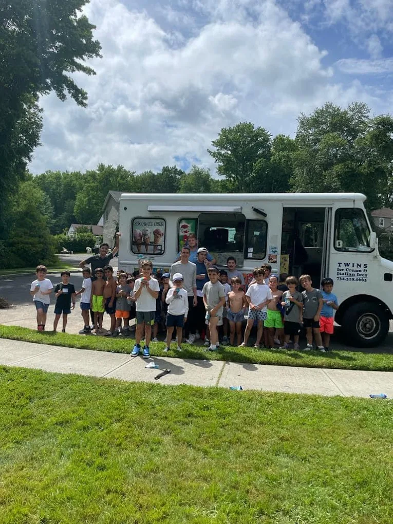 Summer camp group with the Twins Ice Cream truck